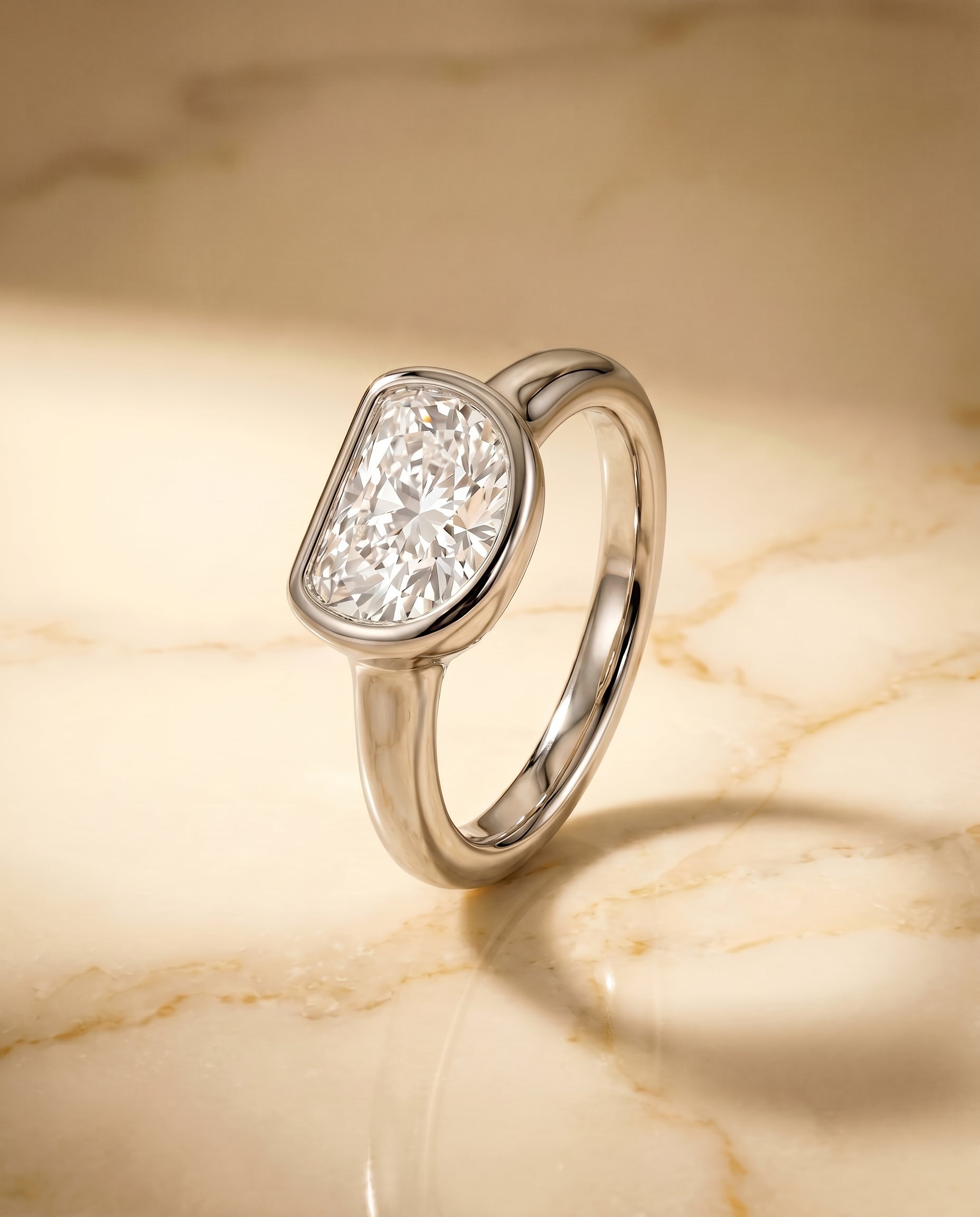 Bezel Solitaire In Half Moon styling on The Agnes diamond engagement ring setting | RockHer