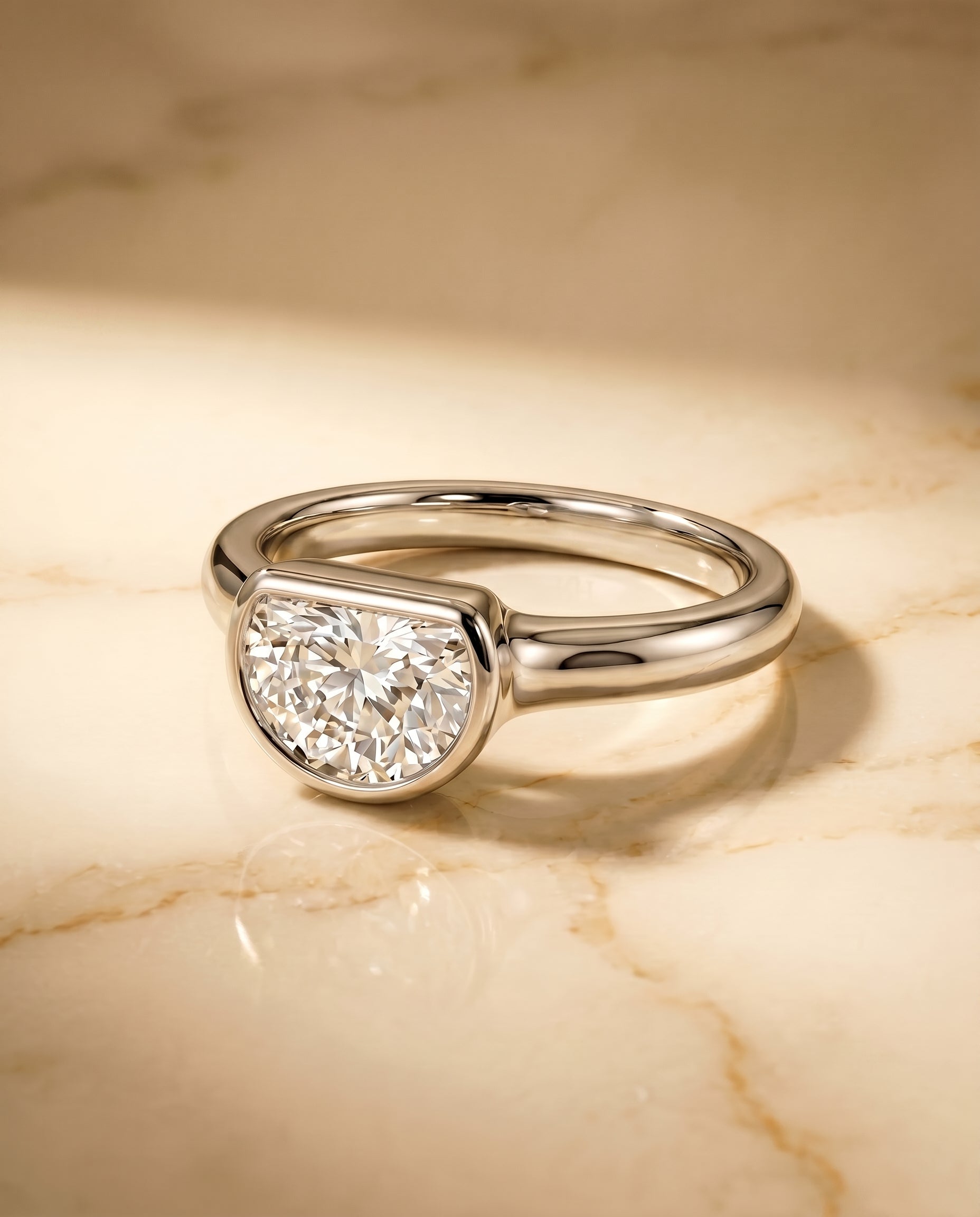 The Agnes Bezel Solitaire In Half Moon Engagement Ring Setting in Platinum