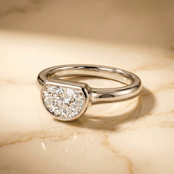 The Agnes Bezel Solitaire In Half Moon Engagement Ring Setting in Platinum