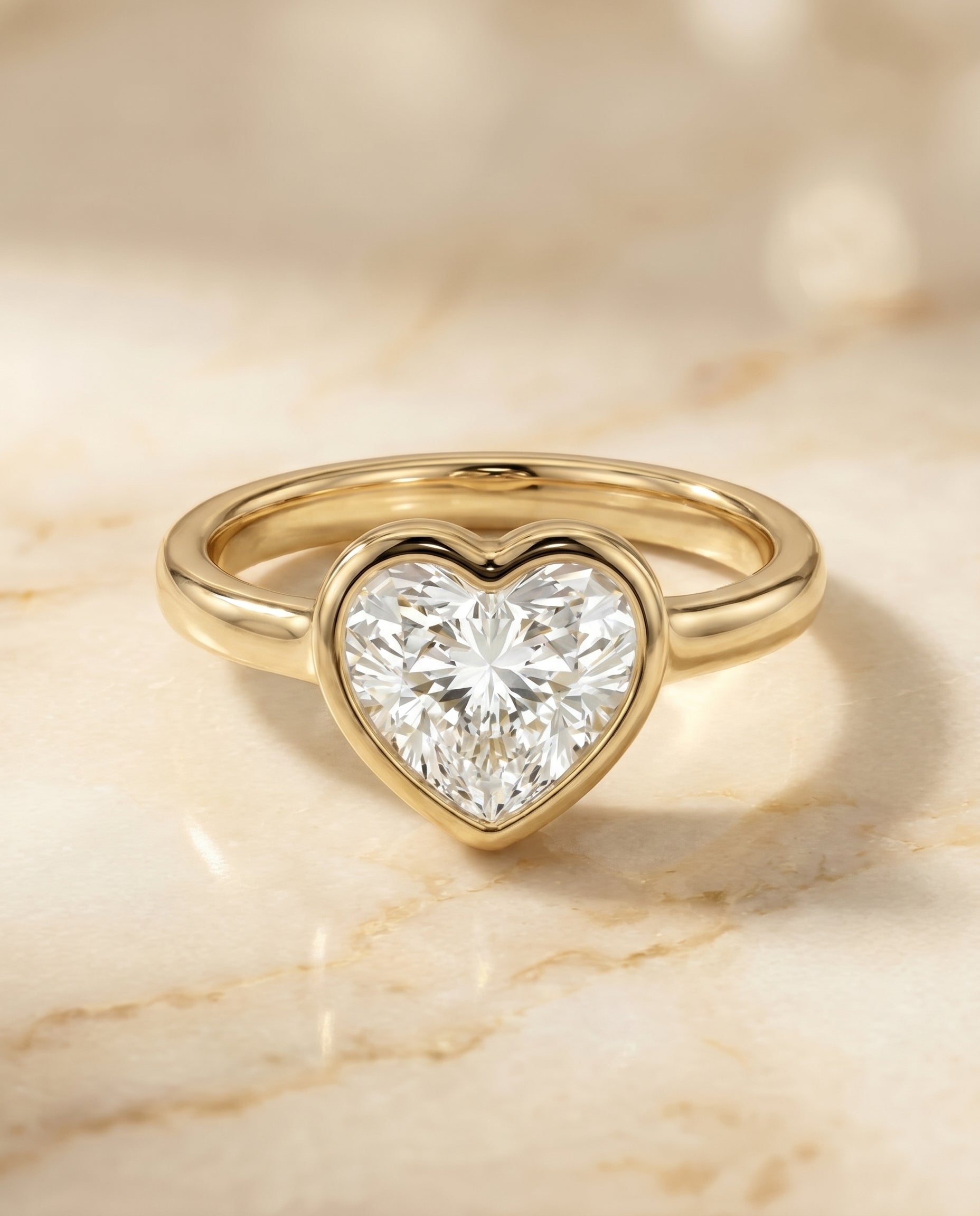 The Agnes Bezel Solitaire In Heart Engagement Ring Setting in 18K Yellow Gold