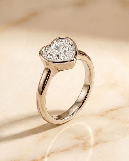 The Agnes Bezel Solitaire In Heart Engagement Ring Setting in Platinum