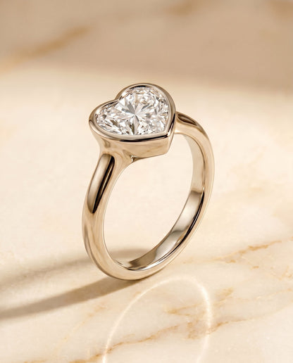 Agnes Select Bezel Solitaire In Heart Lab Diamond Engagement Ring in Platinum, front view | RockHer