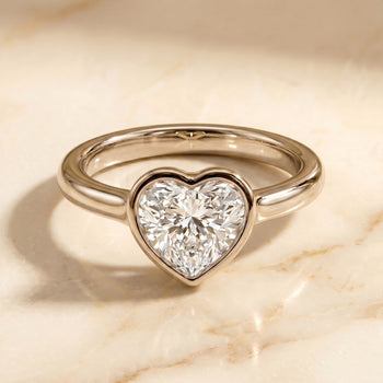 The Agnes Bezel Solitaire In Heart Engagement Ring Setting in 18K White Gold