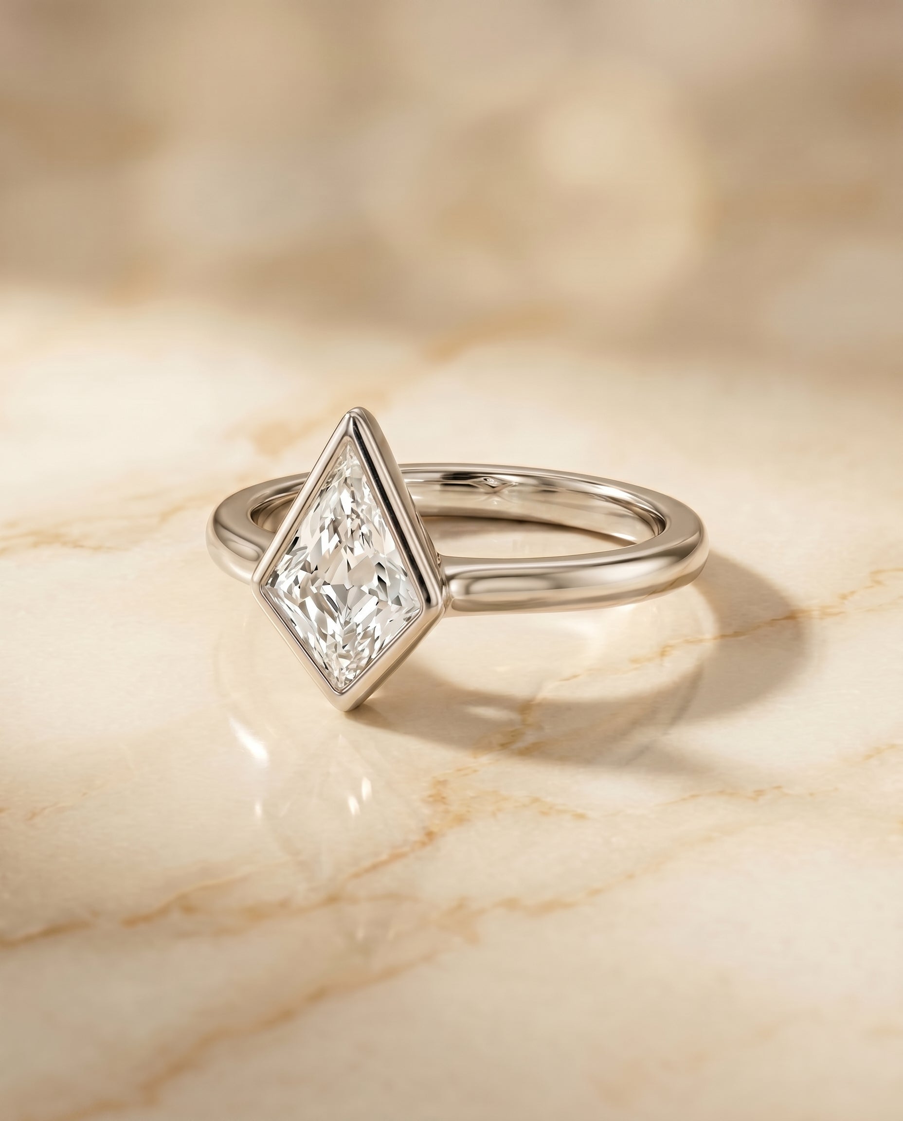 The Agnes Bezel Solitaire In Kite Engagement Ring Setting in Platinum