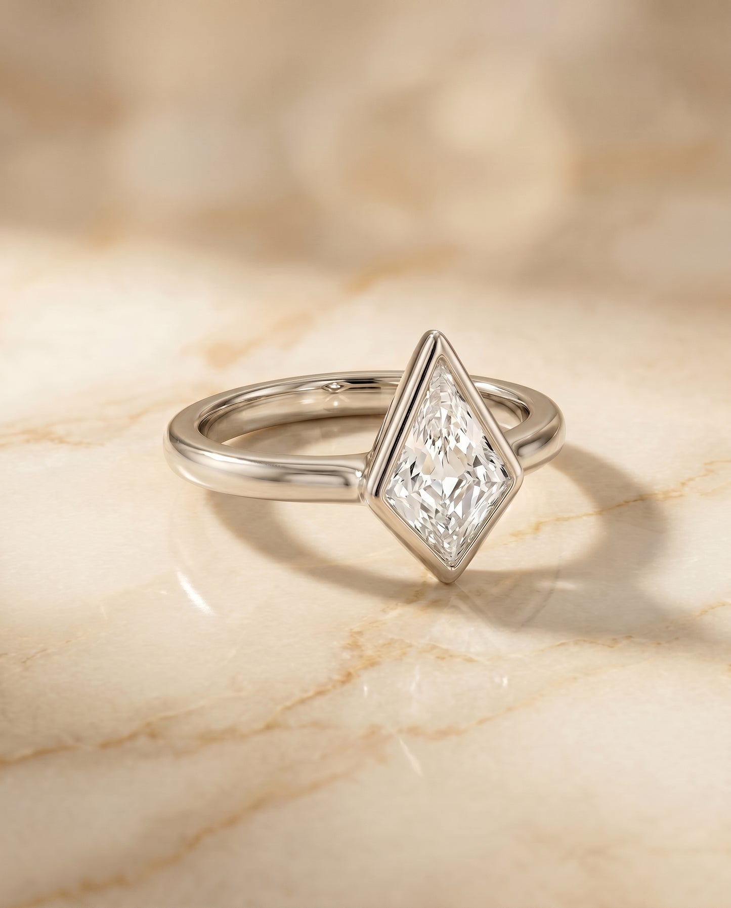 The Agnes Bezel Solitaire In Kite Engagement Ring Setting in Platinum