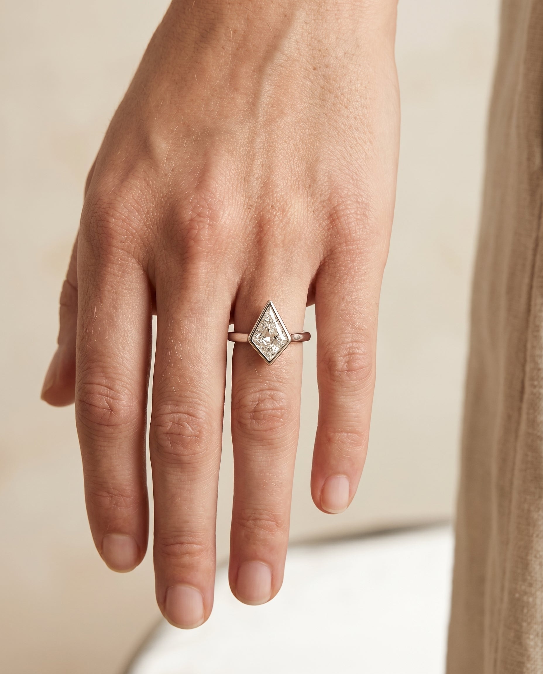 The Agnes engagement ring setting in 18K White Gold, bezel solitaire in design | RockHer