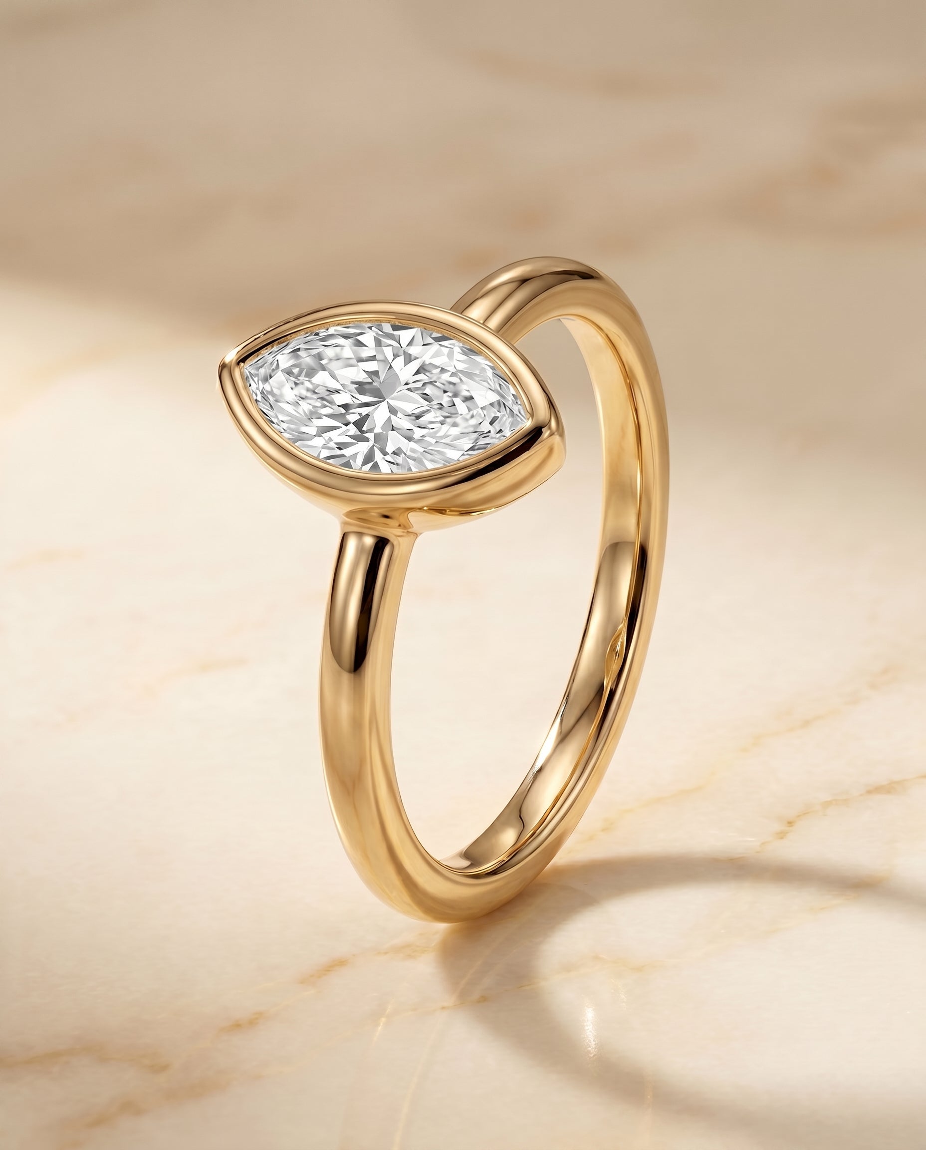 Bezel Solitaire In styling on The Agnes marquise engagement ring setting | RockHer