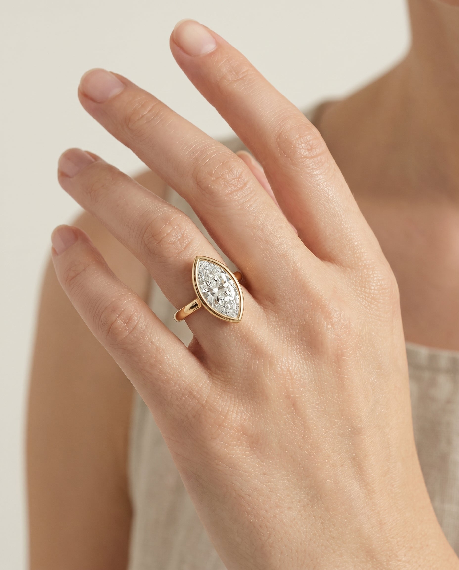 The Agnes engagement ring setting in 18K Yellow Gold, bezel solitaire in design | RockHer