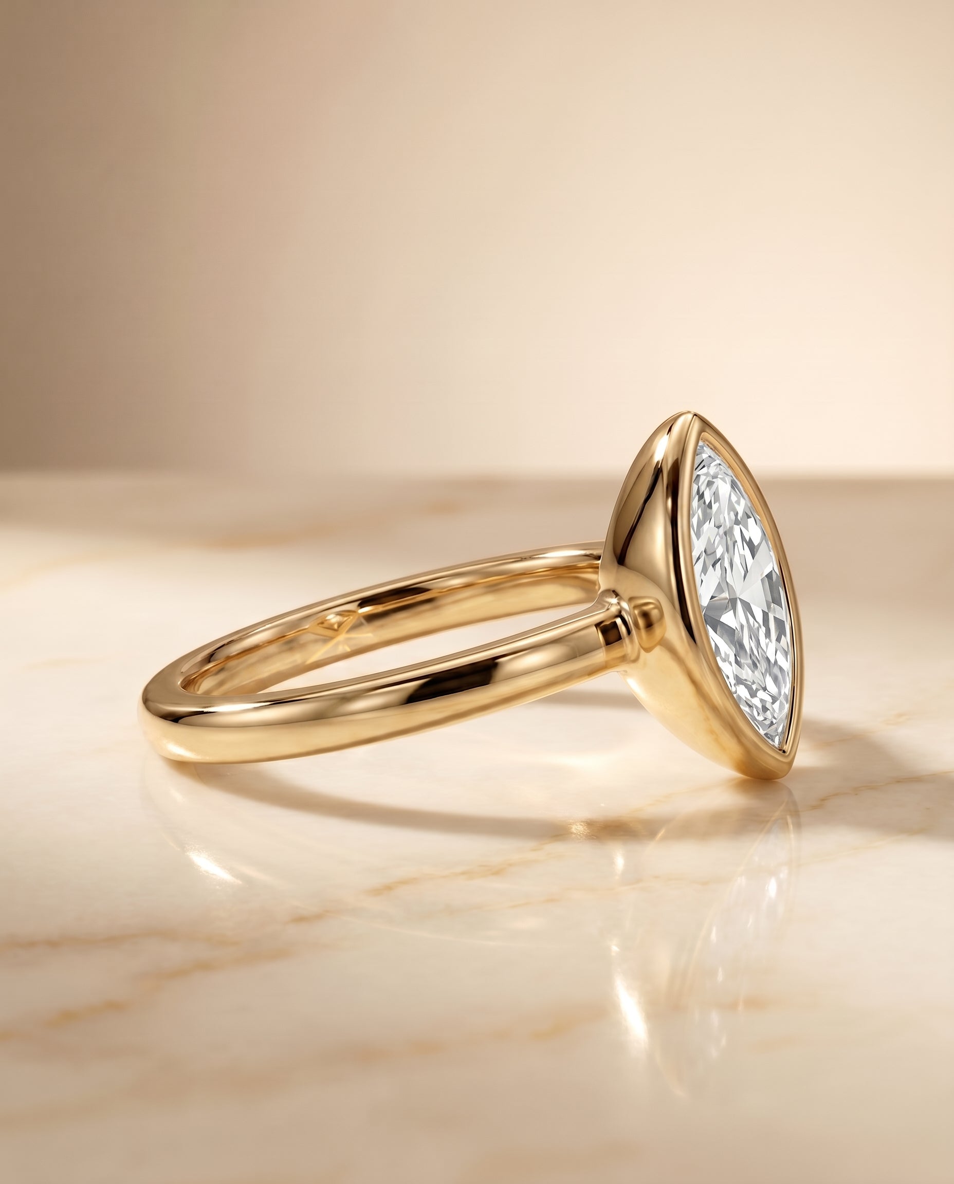 The Agnes setting for marquise diamonds, made to order in 18K Yellow Gold | RockHer