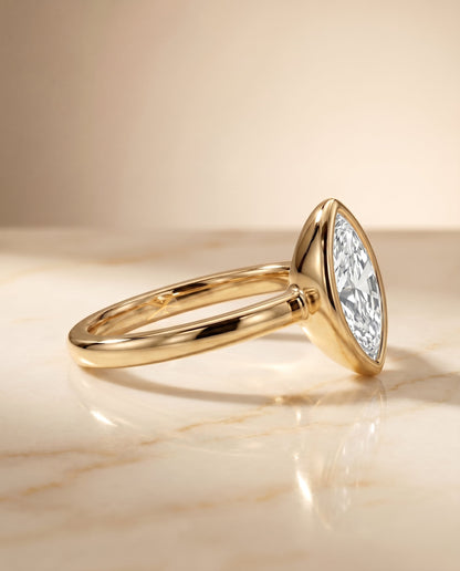 Agnes Select Bezel Solitaire In Marquise Lab Diamond Engagement Ring in 18K Yellow Gold, side view | RockHer