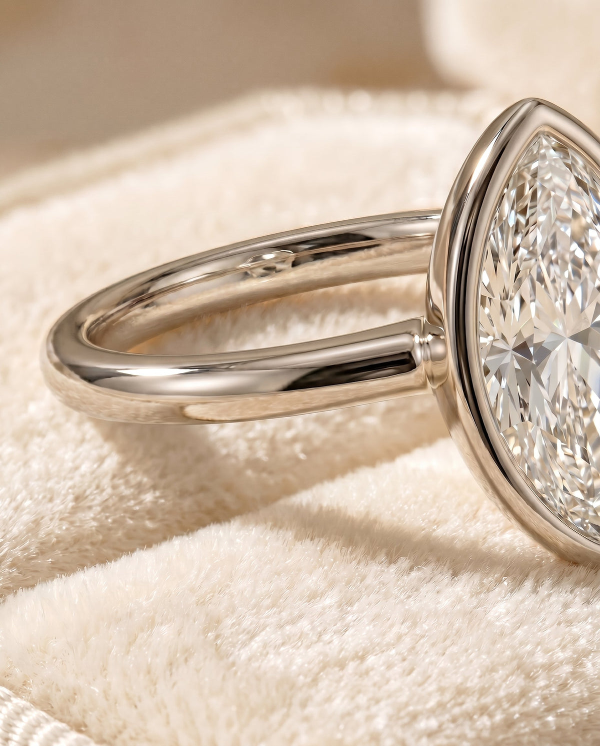 Agnes Select Bezel Solitaire In Marquise Lab Diamond Engagement Ring in 18K White Gold, detail view | RockHer