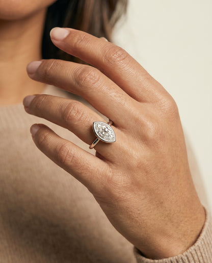 The Agnes Bezel Solitaire In Marquise Engagement Ring Setting in Platinum