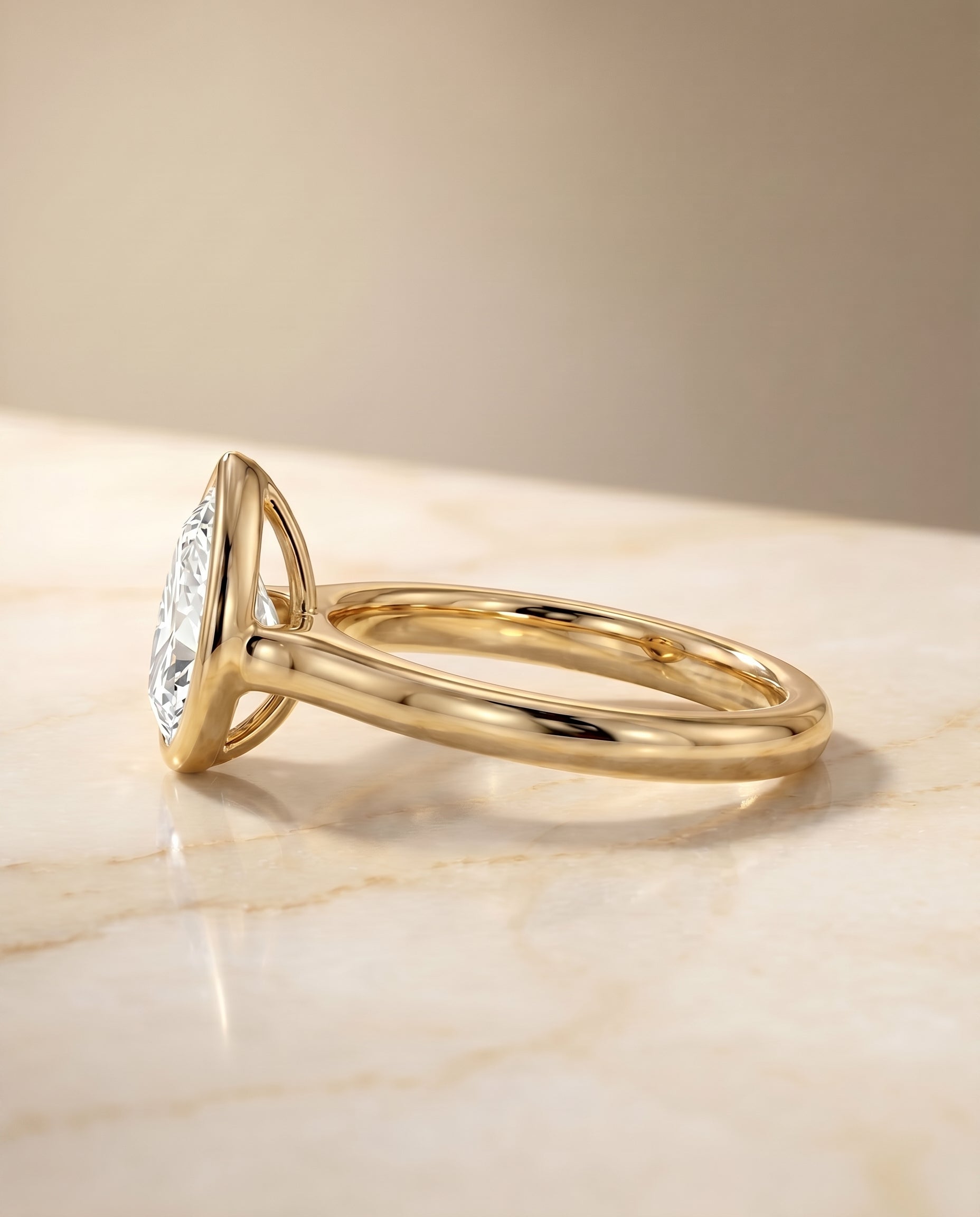The Agnes setting for pear diamonds, made to order in 18K Yellow Gold | RockHer