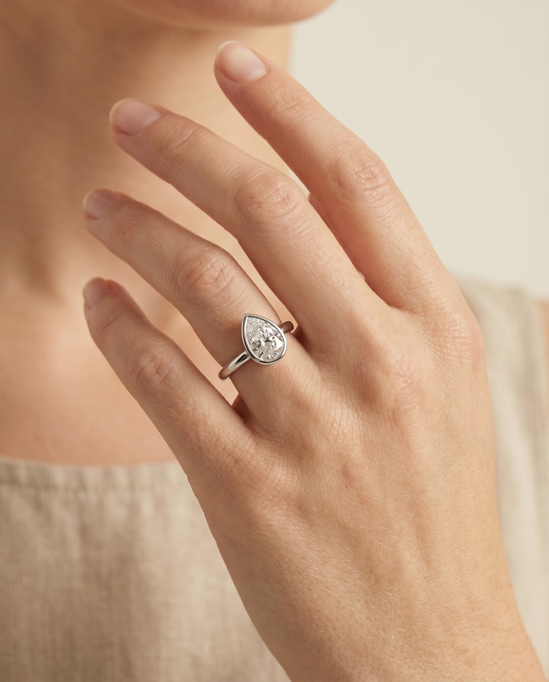The Agnes engagement ring setting in 18K White Gold, bezel solitaire in design | RockHer
