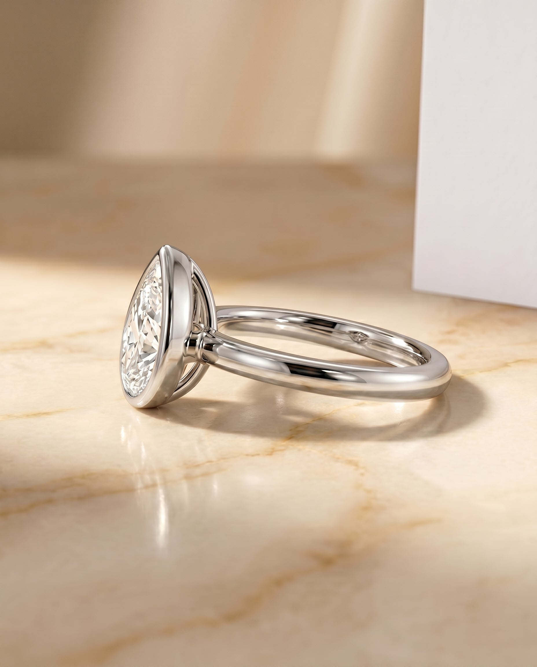 The Agnes setting for pear diamonds, made to order in 18K White Gold | RockHer