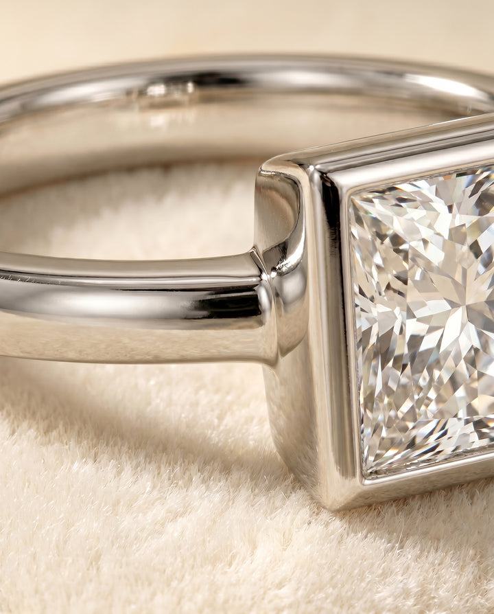 The Agnes Bezel Solitaire Engagement Ring Setting for Princess Diamonds in Platinum