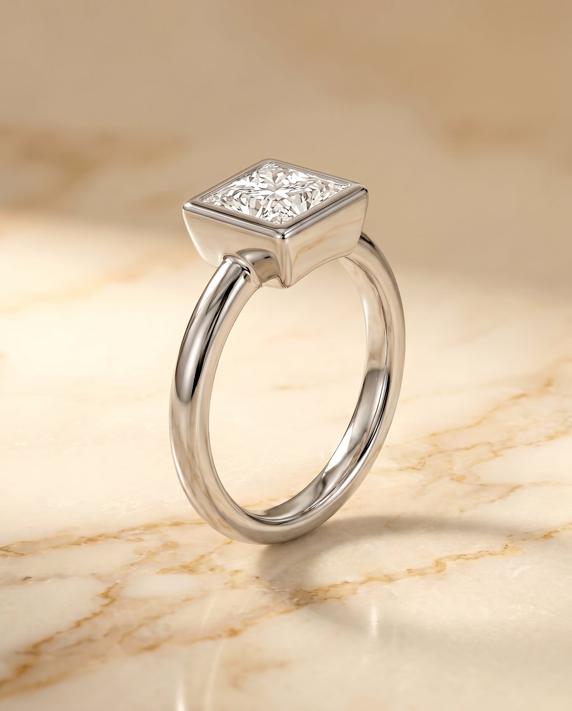 Bezel Solitaire In styling on The Agnes princess engagement ring setting | RockHer