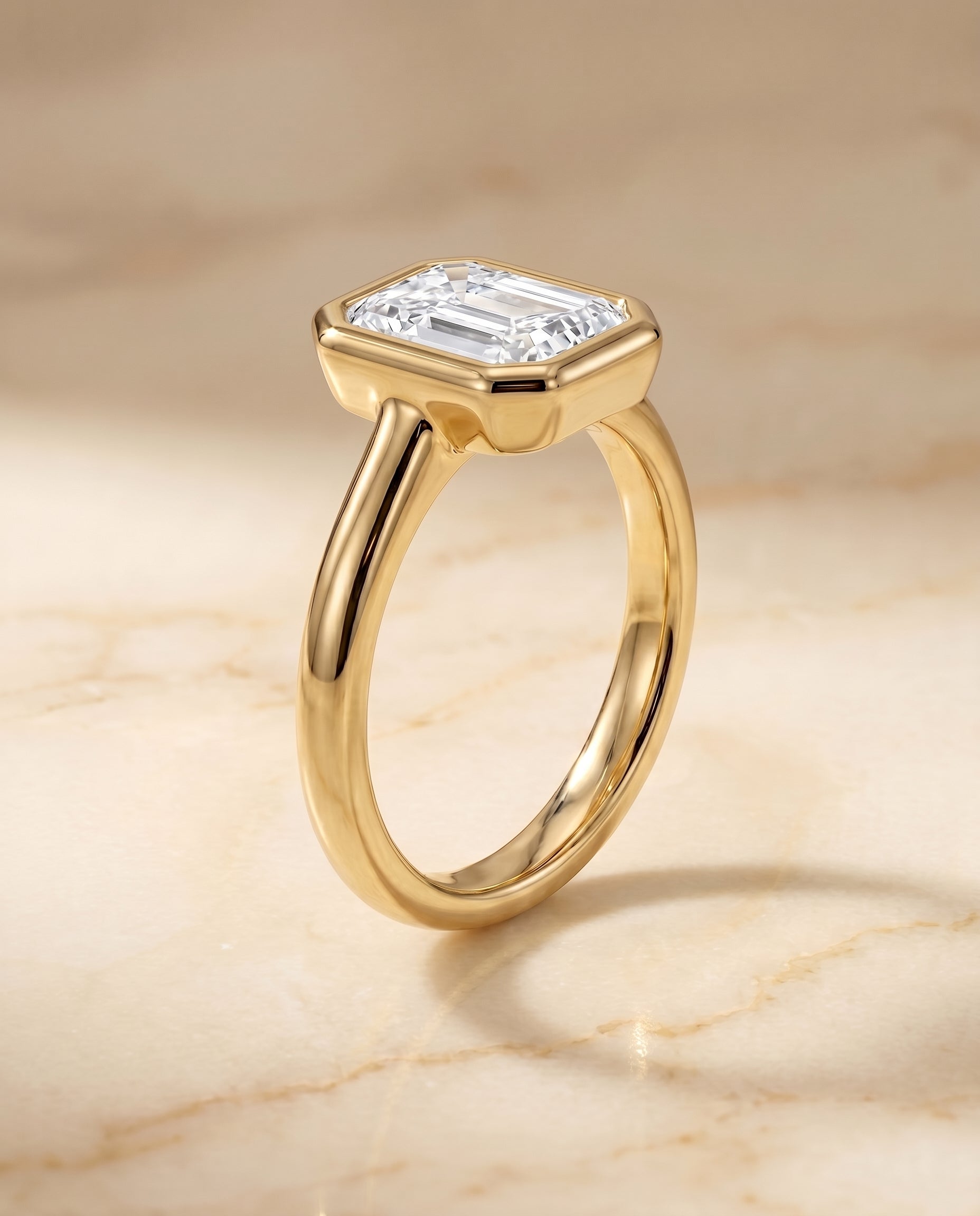 Bezel Solitaire In Cut styling on The Agnes radiant engagement ring setting | RockHer