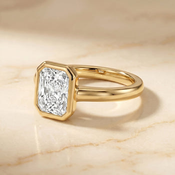 The Agnes Select Bezel Solitaire In Radiant Cut Lab Diamond Engagement Ring in 18K Yellow Gold