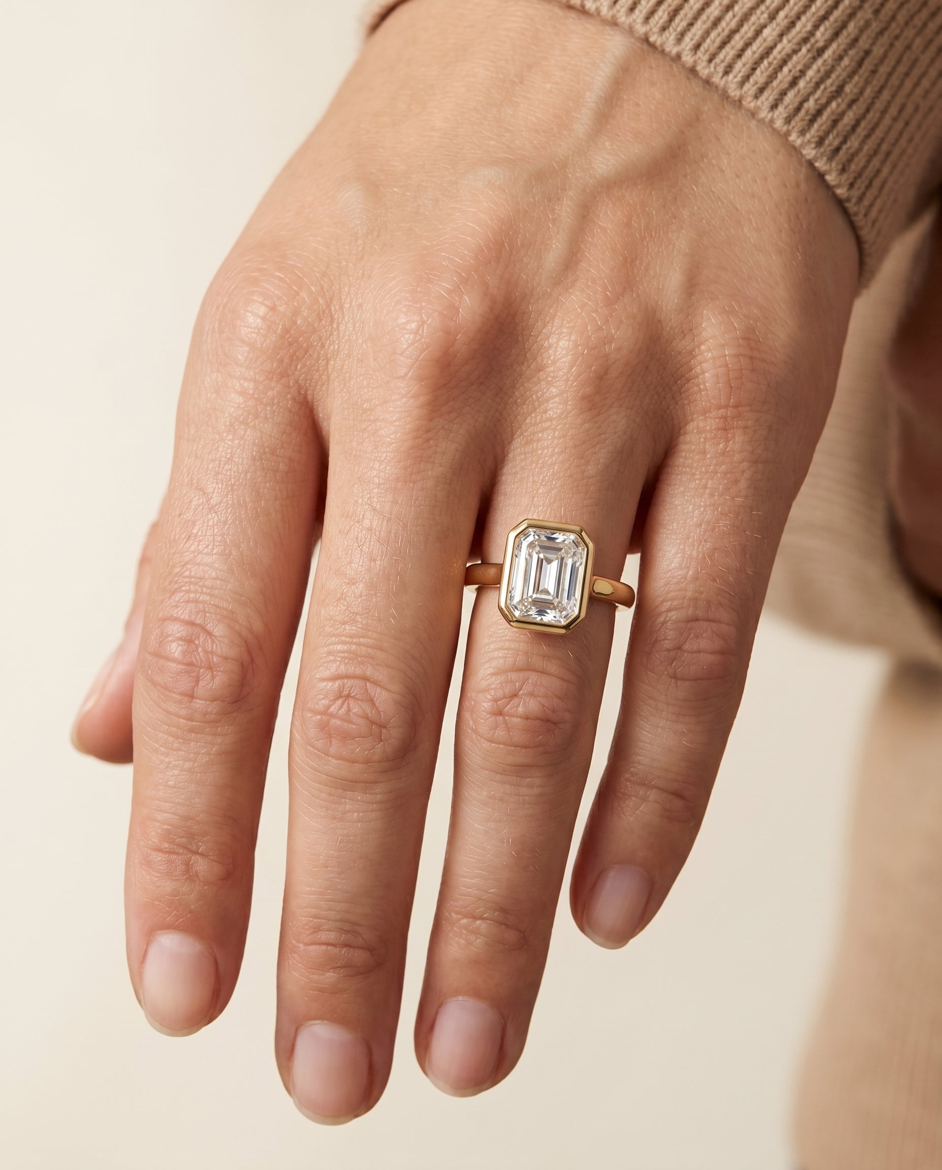 The Agnes engagement ring setting in 18K Yellow Gold, bezel solitaire in cut design | RockHer