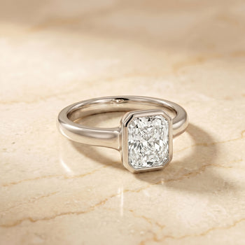 The Agnes Square Bezel Solitaire In Step Engagement Ring Setting in Platinum