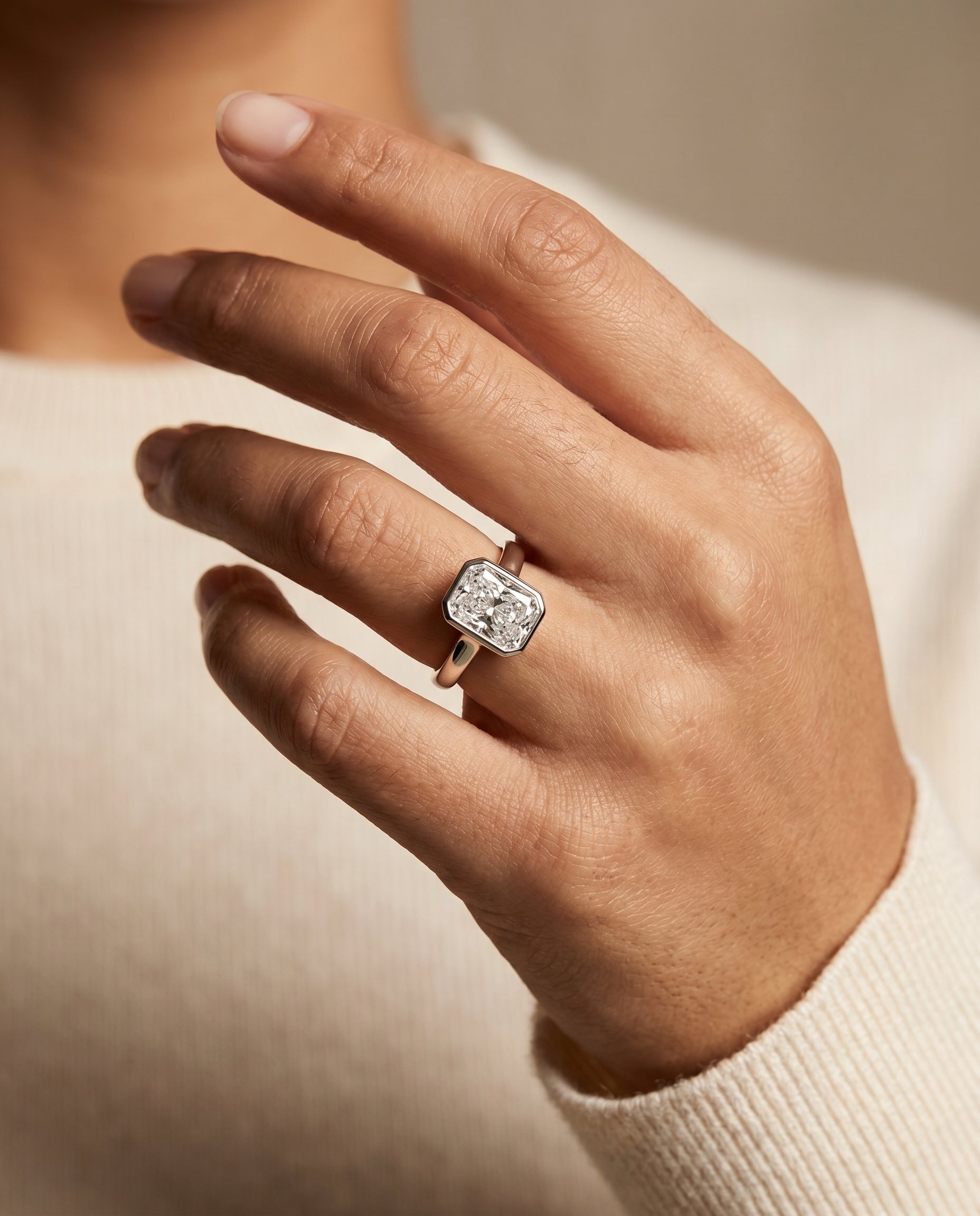 The Agnes engagement ring setting in 18K White Gold, bezel solitaire in cut design | RockHer