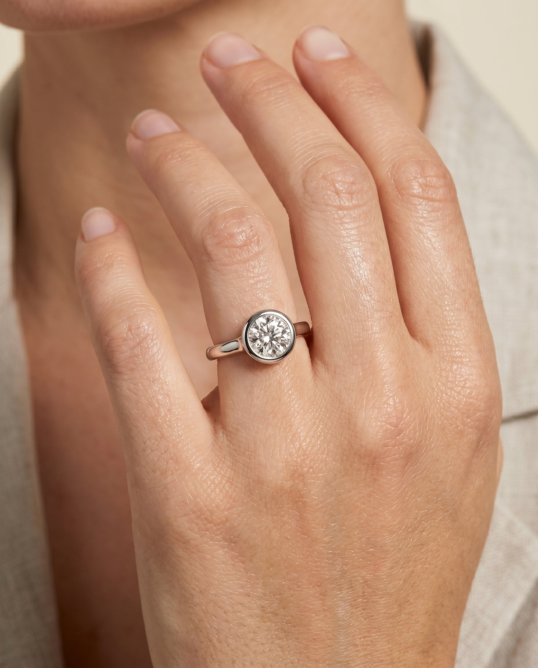 The Agnes engagement ring setting in 18K White Gold, bezel solitaire in design | RockHer