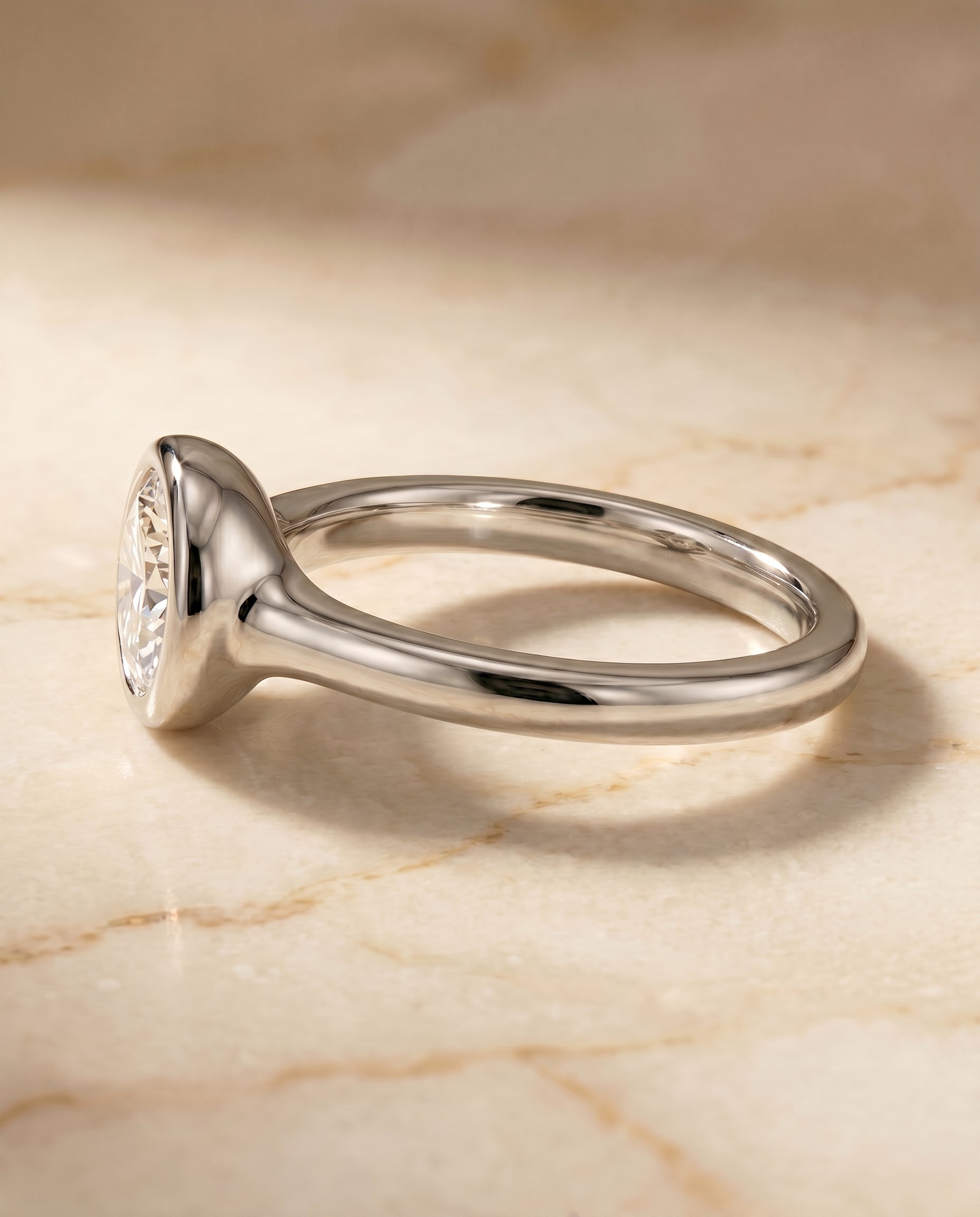 The Agnes setting for round diamonds, made to order in 18K White Gold | RockHer