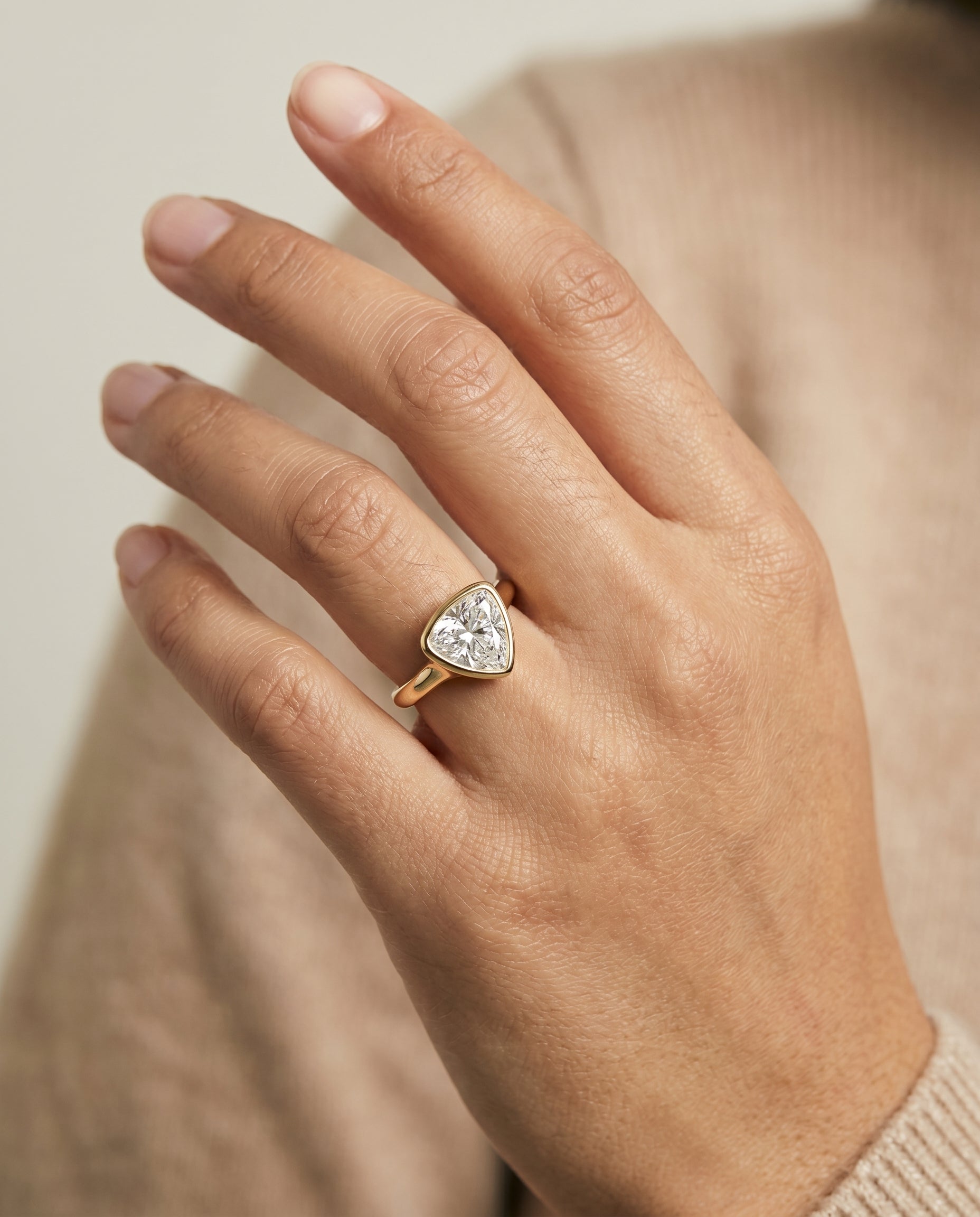 The Agnes engagement ring setting in 18K Yellow Gold, bezel solitaire in shield design | RockHer