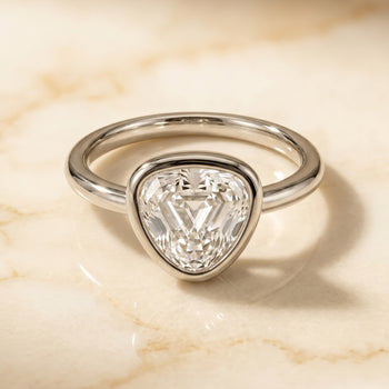 The Agnes Bezel Solitaire In Shield Engagement Ring Setting in Platinum