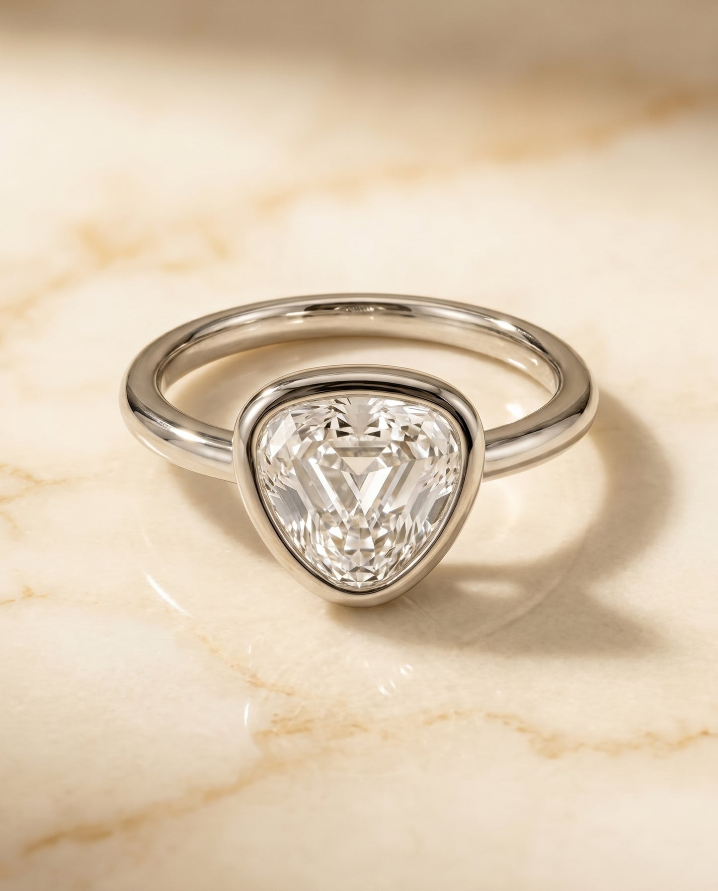 The Agnes Bezel Solitaire In Shield Engagement Ring Setting in 18K White Gold