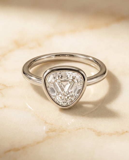 The Agnes Bezel Solitaire In Shield Engagement Ring Setting in 18K White Gold