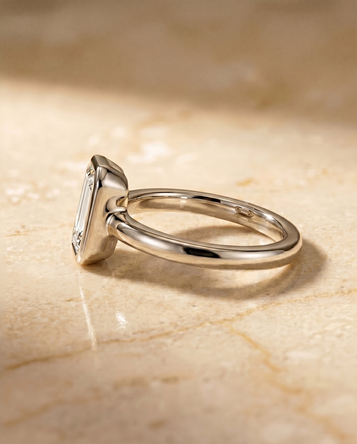 The Agnes Bezel Solitaire In Tapered Baguette Engagement Ring Setting in Platinum