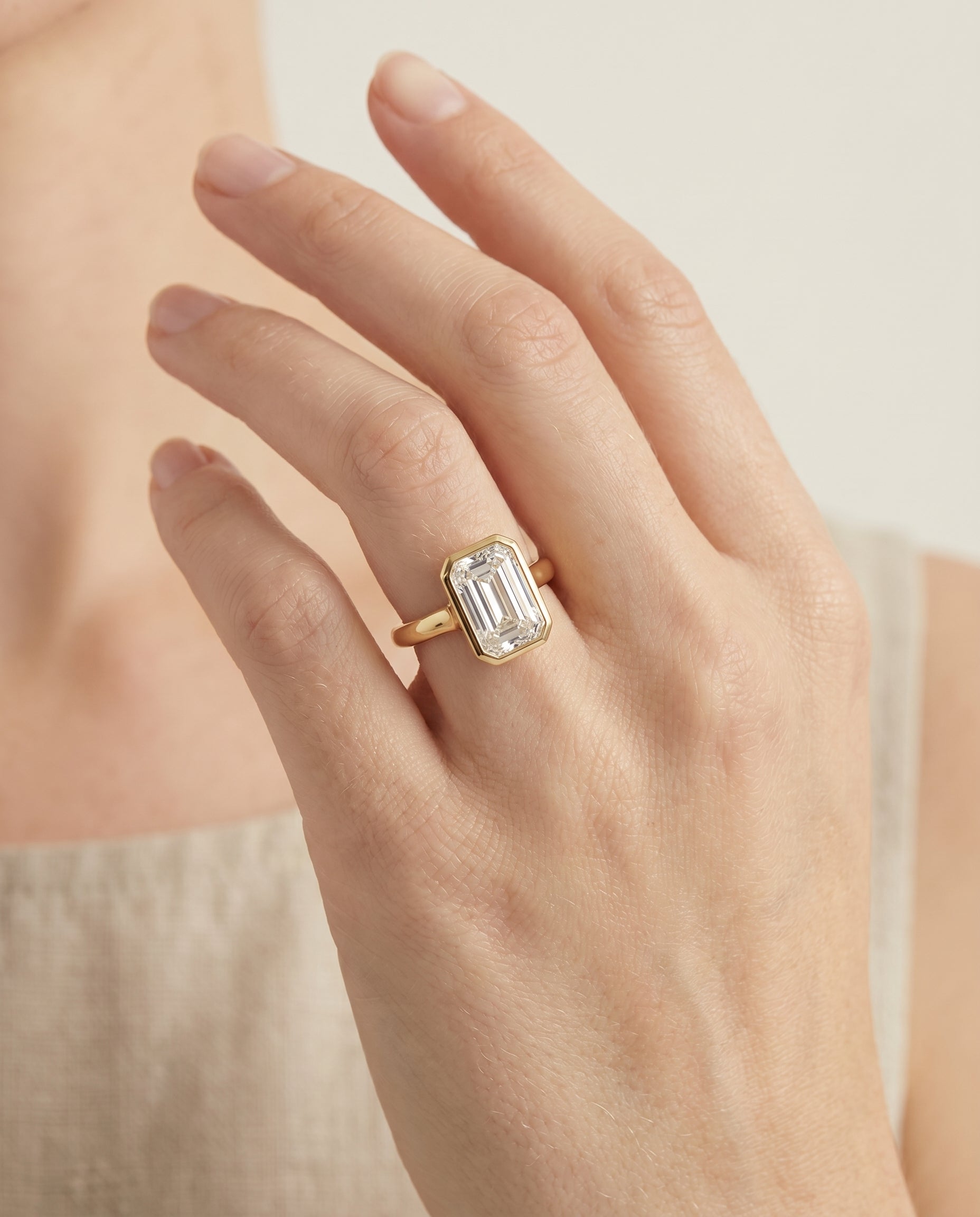 The Agnes engagement ring setting in 18K Yellow Gold, bezel solitaire in tapered design | RockHer