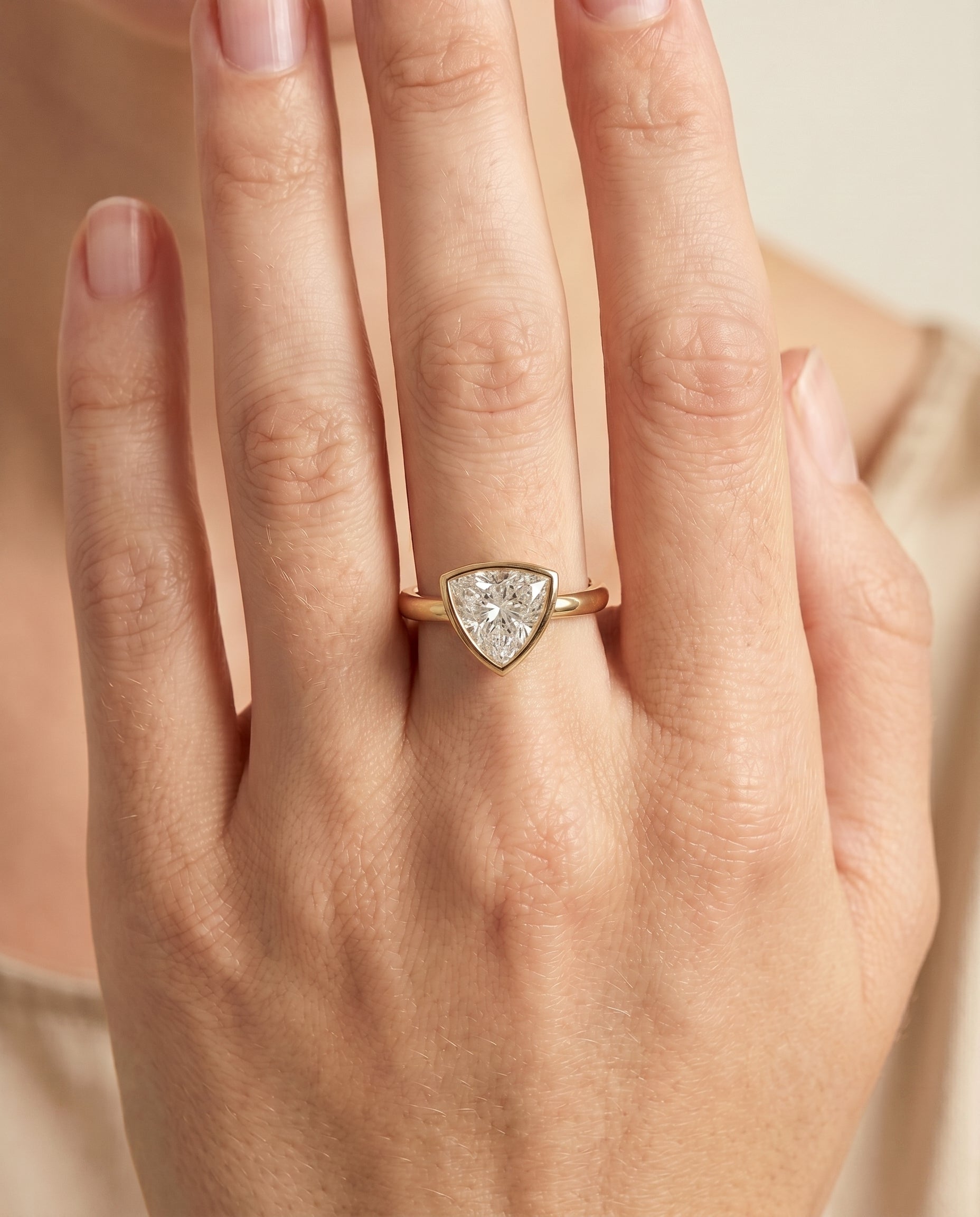 The Agnes engagement ring setting in 18K Yellow Gold, bezel solitaire in design | RockHer