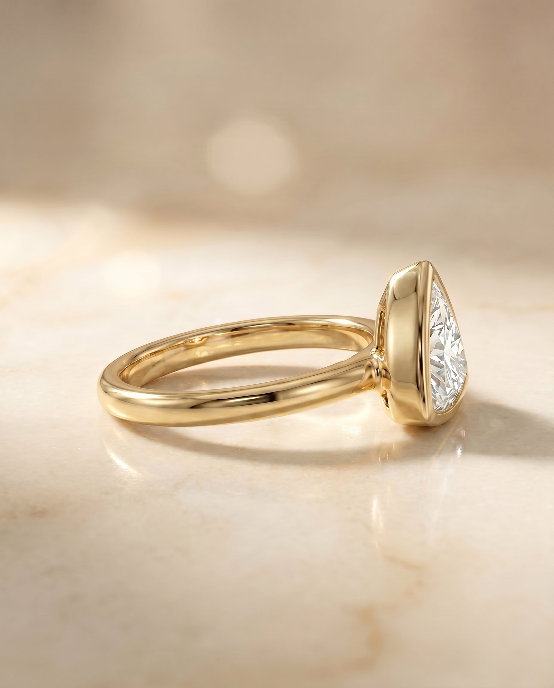 The Agnes setting for trillion diamonds, made to order in 18K Yellow Gold | RockHer