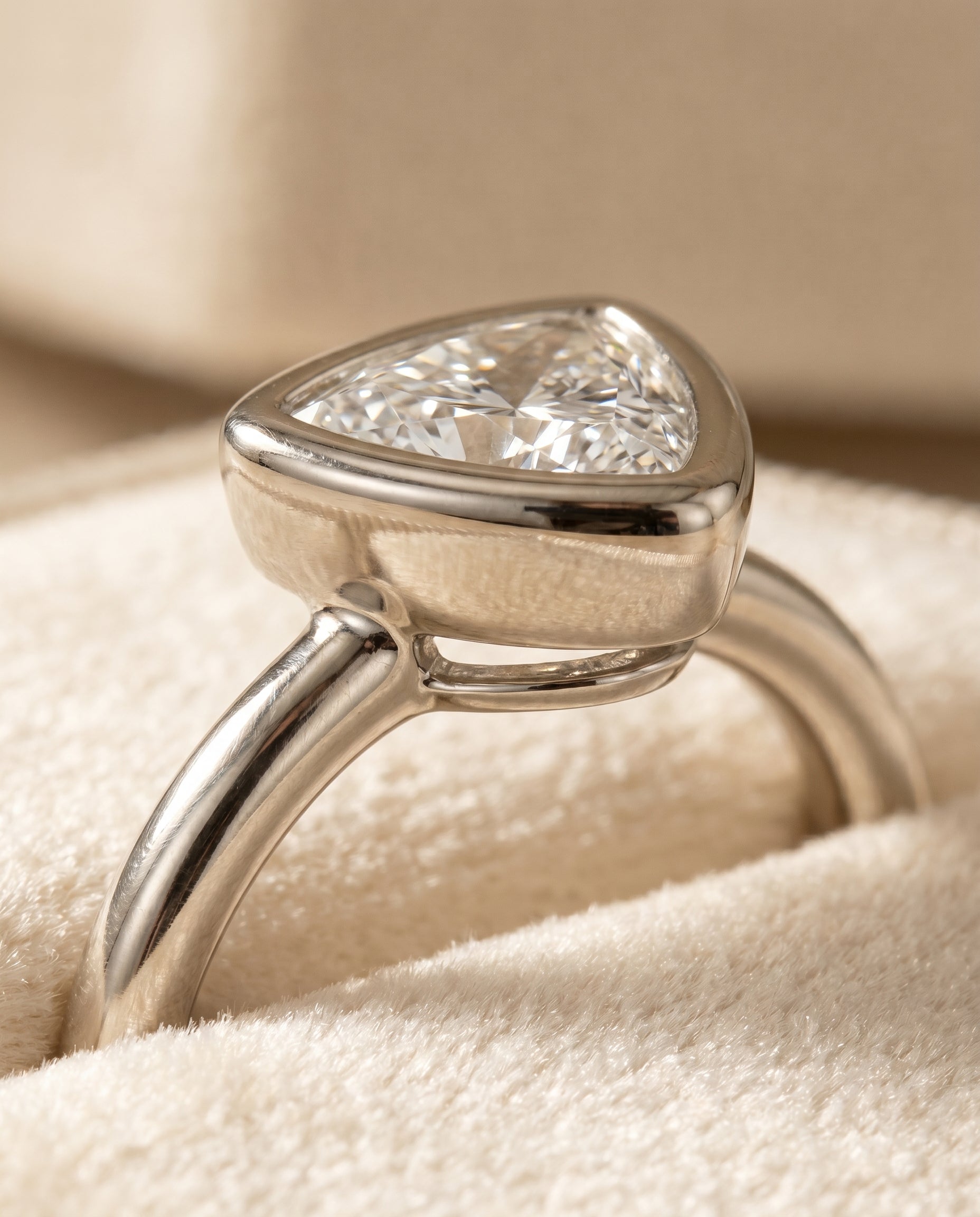 Platinum band of The Agnes trillion engagement ring setting | RockHer
