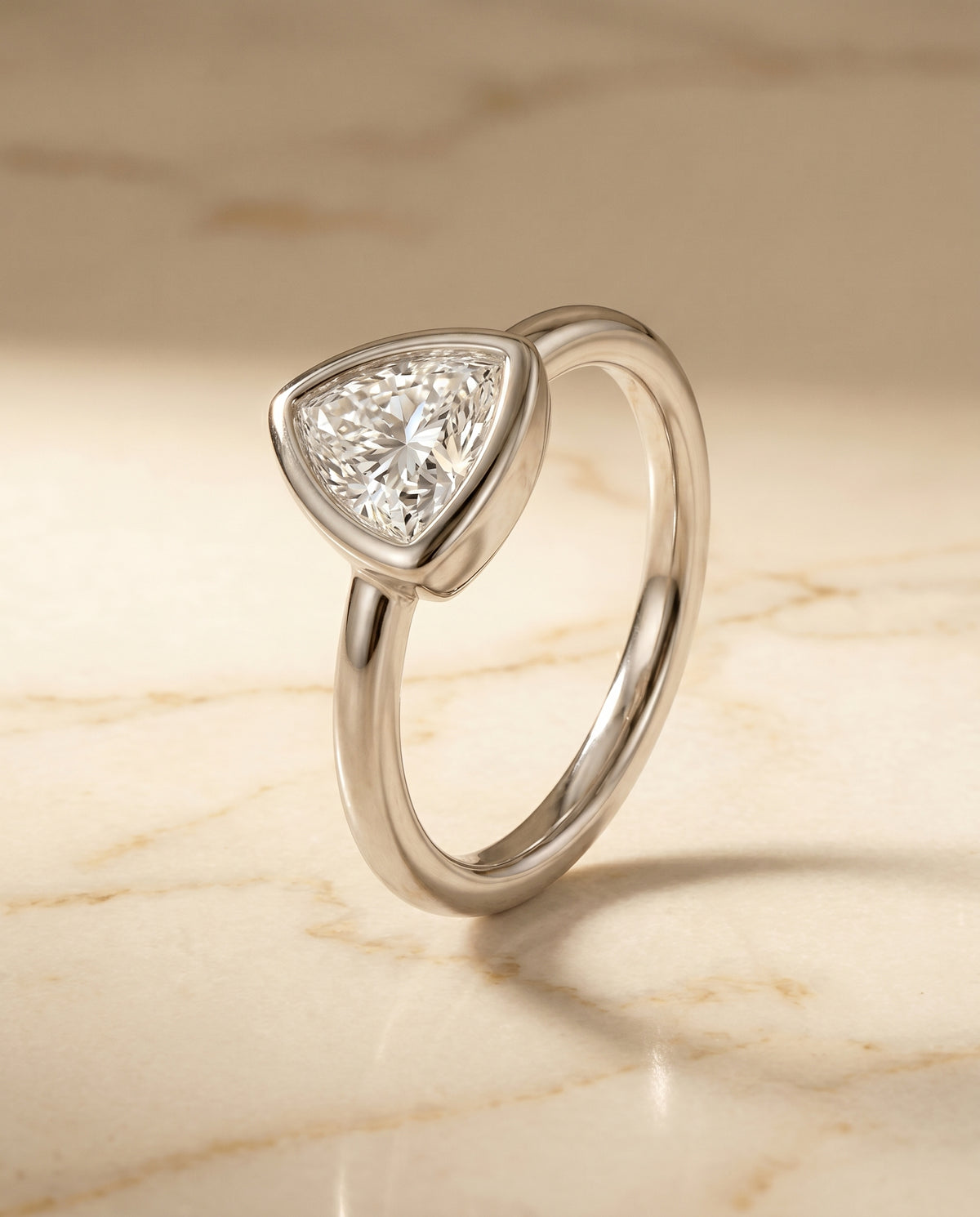 Select Bezel Solitaire styling on The Agnes trillion engagement ring setting | RockHer