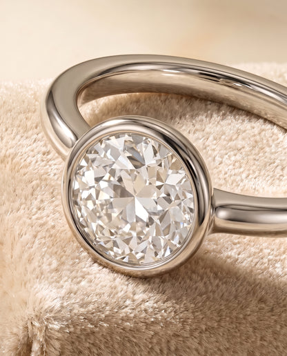The Agnes Bezel Solitaire In Old European Engagement Ring Setting in Platinum