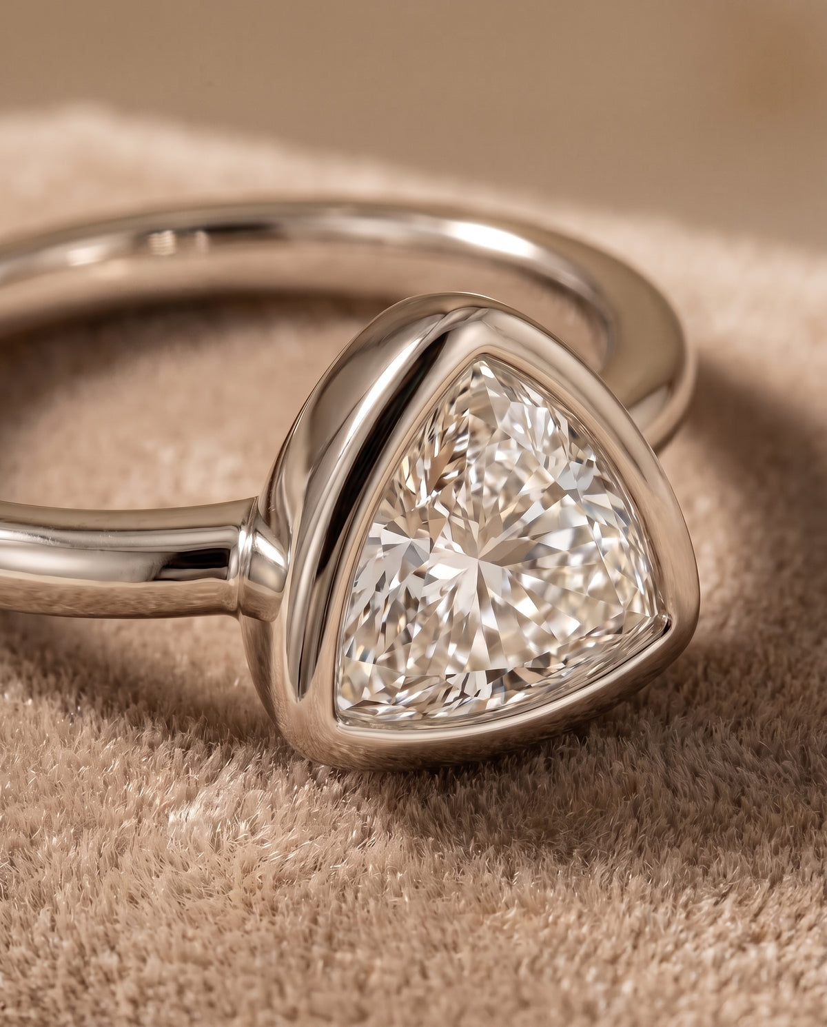 The Agnes Bezel Solitaire In Trillion Engagement Ring Setting in 18K White Gold