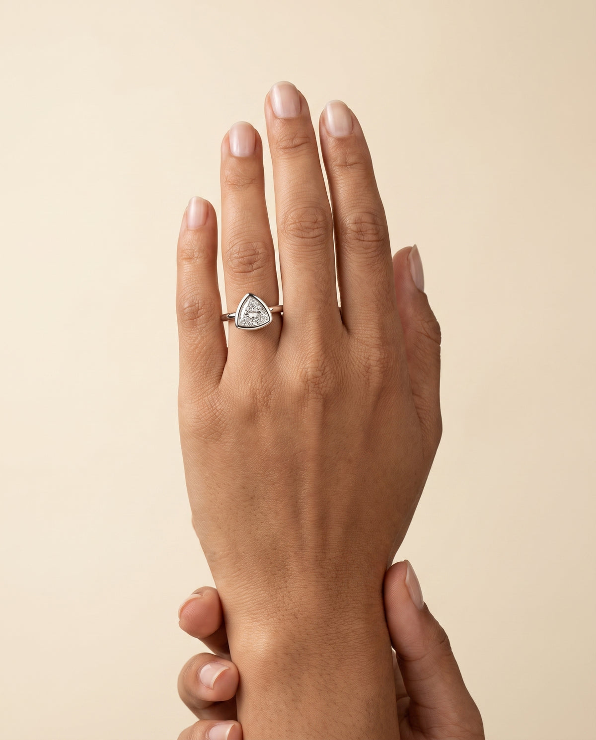 The Agnes Bezel Solitaire In Trillion Engagement Ring Setting in 18K White Gold