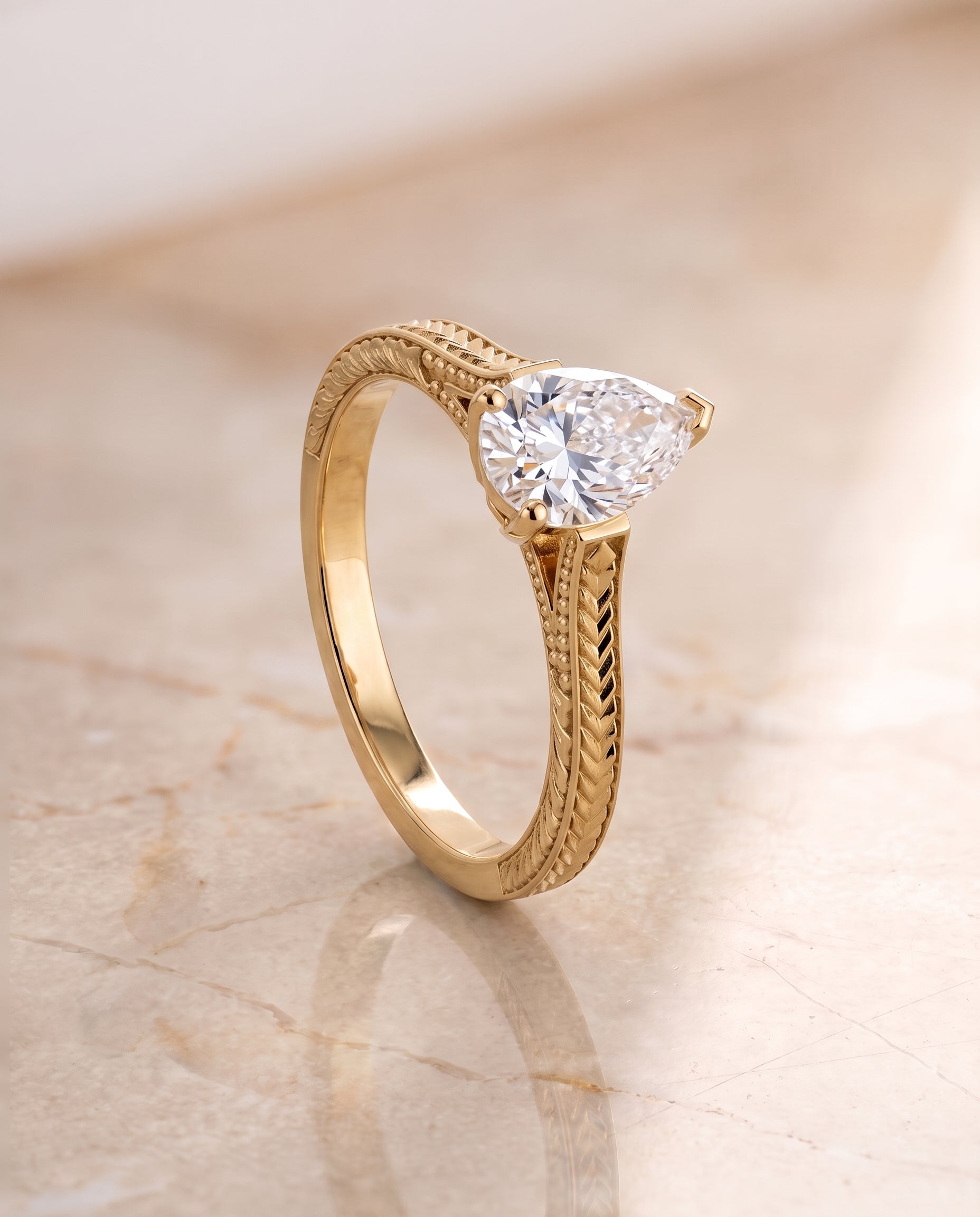 The Aida setting for pear diamonds, made to order in 18K Yellow Gold | RockHer