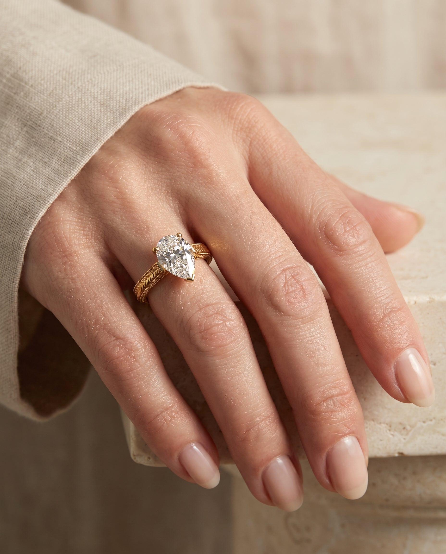 The Aida engagement ring setting in 18K Yellow Gold, hand engraved vintage cathedral solitaire design | RockHer