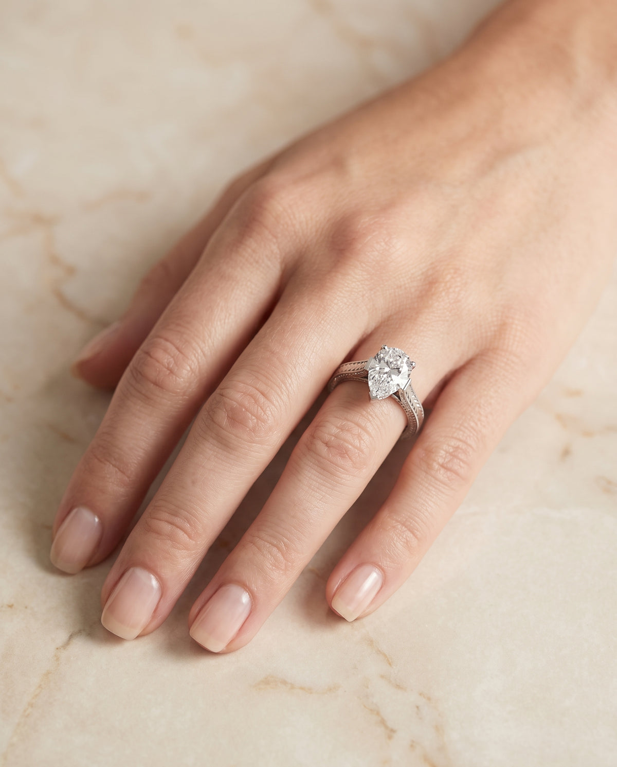 The Aida Hand Engraved Vintage Cathedral Solitaire Pear Engagement Ring Setting in Platinum