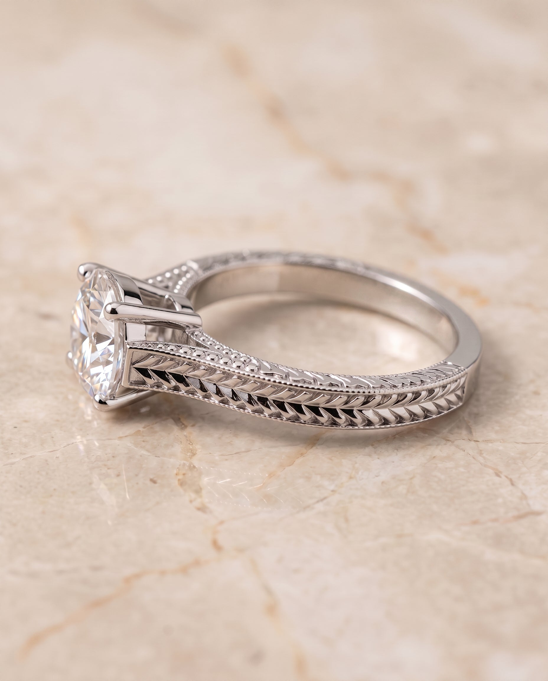 The Aida setting for round diamonds, made to order in Platinum | RockHer