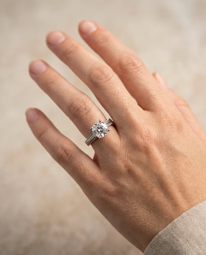 Aida Select Vintage Solitaire Cushion Cut Lab Diamond Engagement Ring in Platinum, shown on hand | RockHer