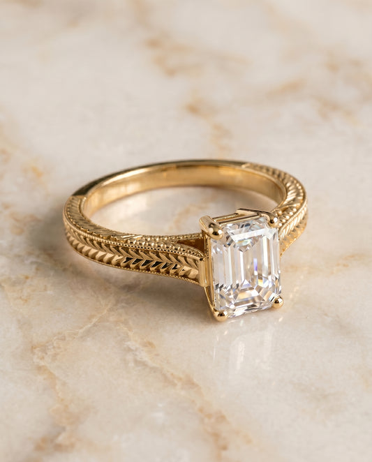 The Aida Vintage Solitaire Engagement Ring Setting for Emerald Cut Diamonds in 18K Yellow Gold
