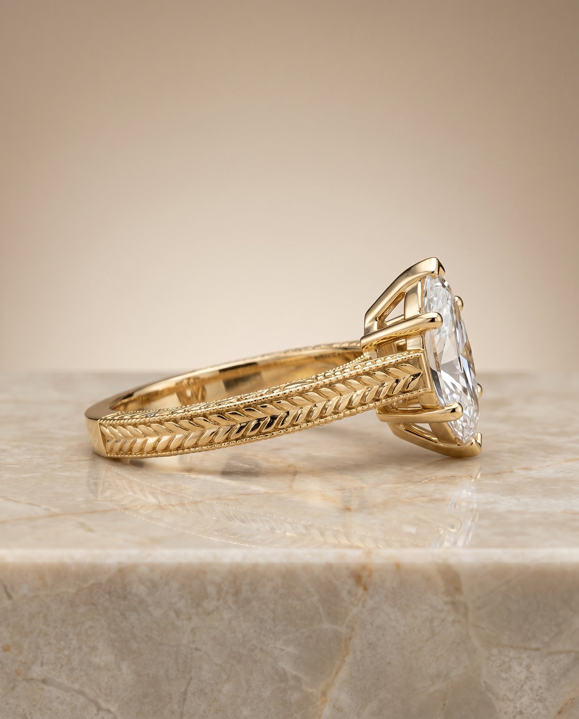 The Aida setting for marquise diamonds, made to order in 18K Yellow Gold | RockHer