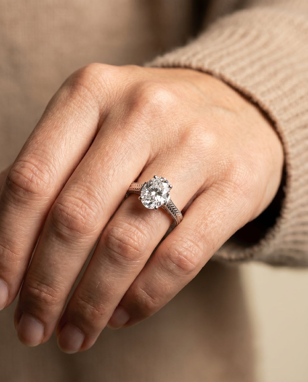 Aida Select Vintage Solitaire Oval Lab Diamond Engagement Ring in Platinum, shown on hand | RockHer