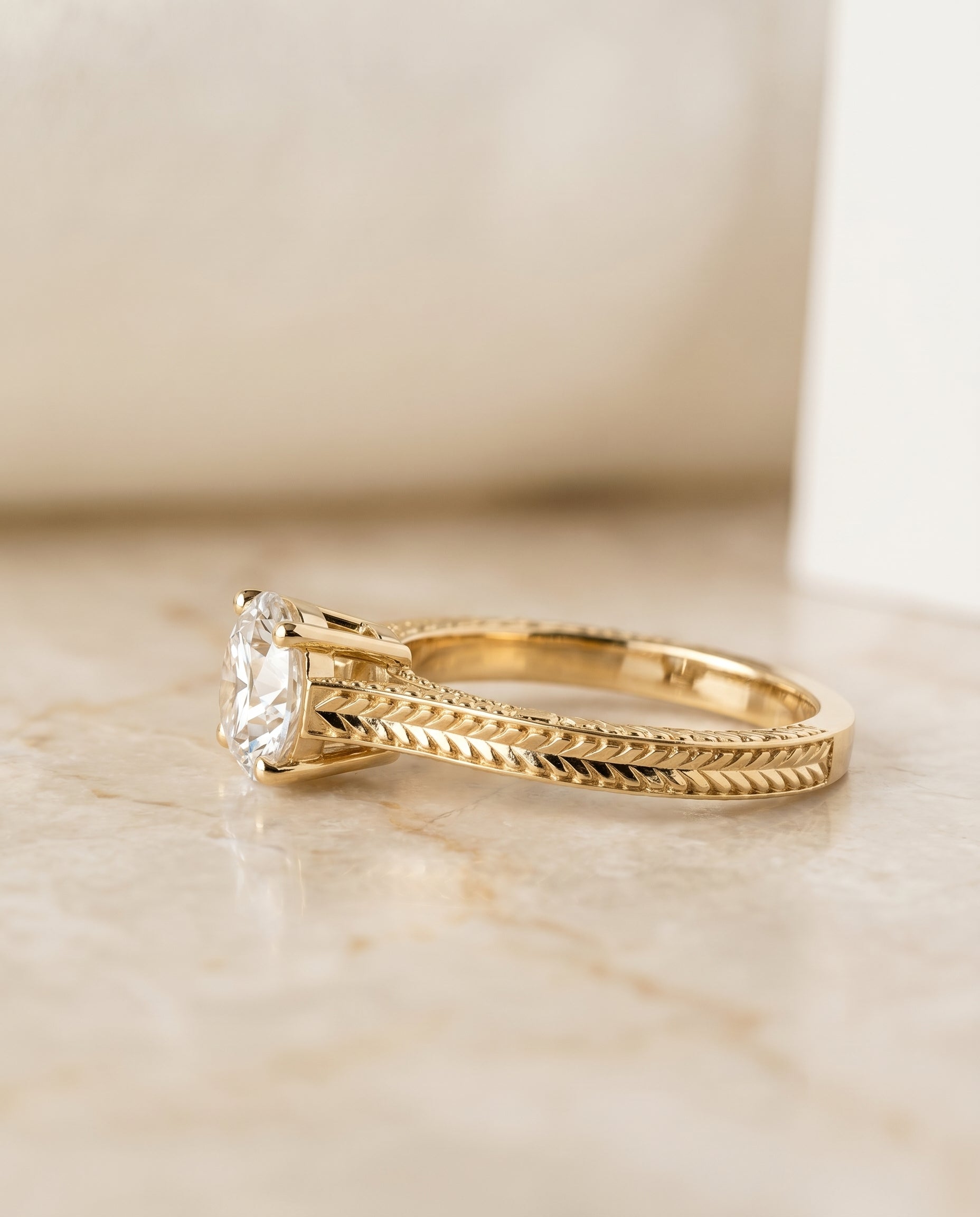 The Aida setting for round diamonds, made to order in 18K Yellow Gold | RockHer